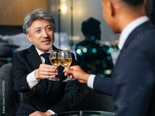 toast, celebration, party, glass, smile, business, businessperson, people, wine, champagne, alcohol, drinking, event, entertainment, countdown, new year, new year's eve, businessman, president, manage photo