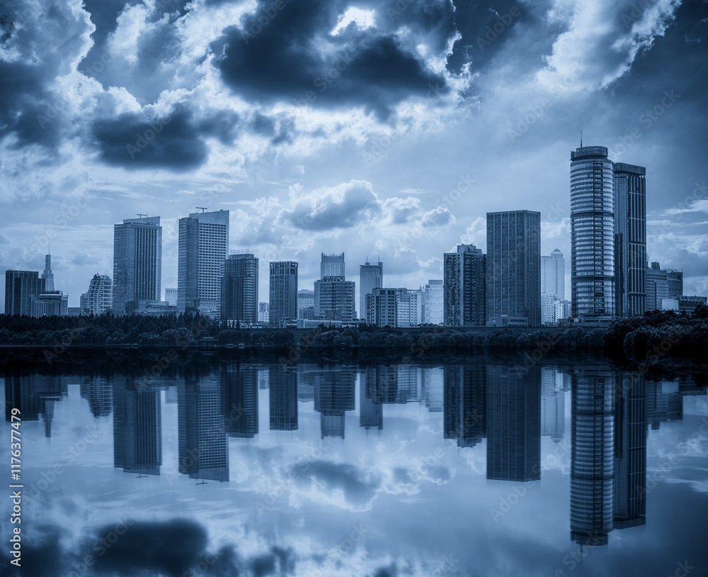 Serene Cityscape Reflections Under Dramatic Clouds Serene Cityscape Reflections Under Dramatic Clouds