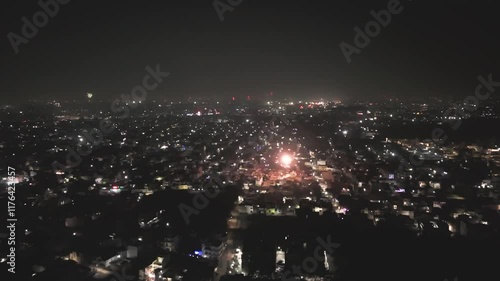 New Year Fireworks Drone View at Night, Sky Shots and Festive Lights Aerial Footage, Nighttime Celebrations with Fireworks, Aerial Night View of New Year Celebrations Stock Photo.



 photo