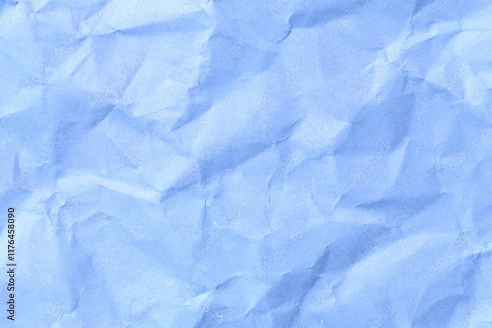 Obraz premium Wrinkled Blue Paper Background for Creative Projects