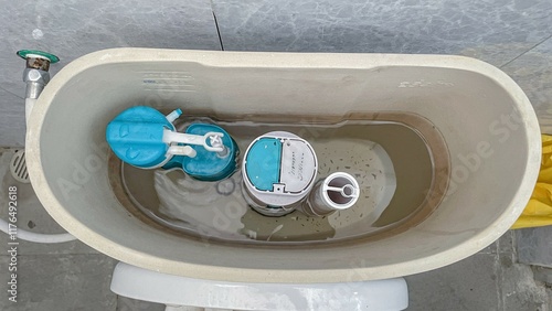 Tableau sur toile selective focus on the inside of the toilet auto flush tank