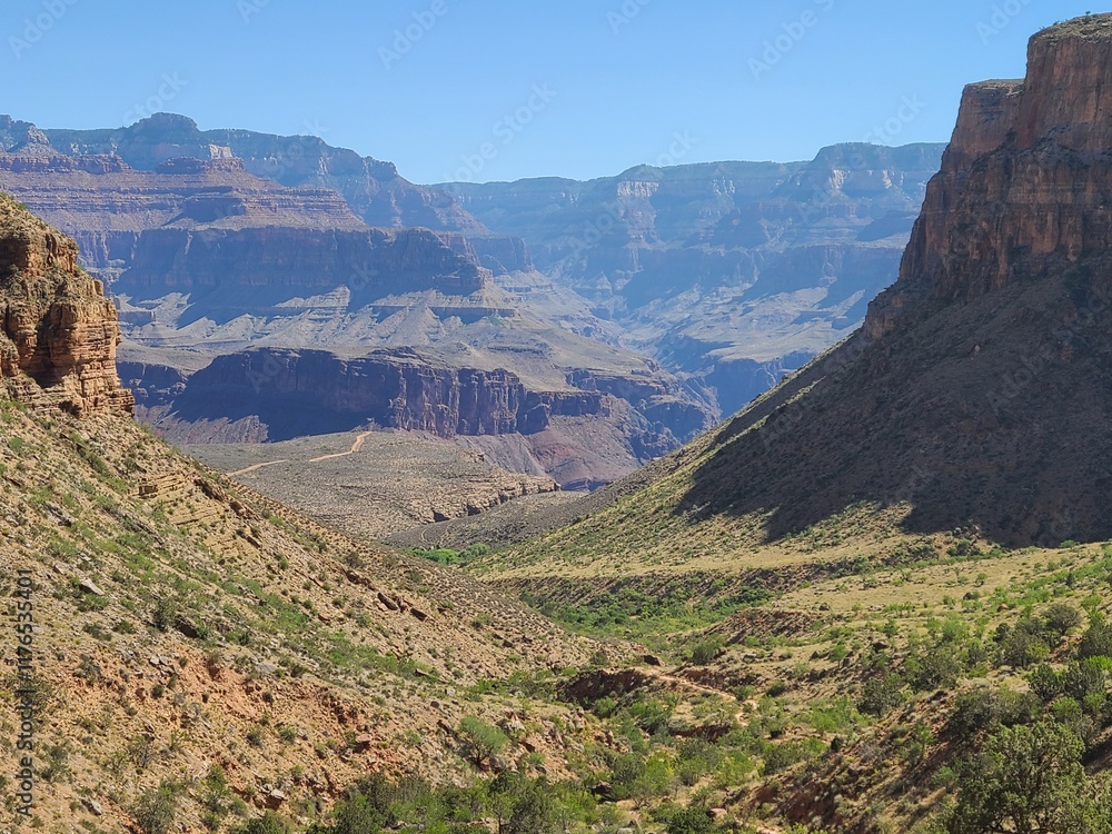 The Inner Canyon can be seen in the distance from the Bright Angel trail near Havasupai Gardens The Inner Canyon can be seen in the distance from the Bright Angel trail near Havasupai Gardens