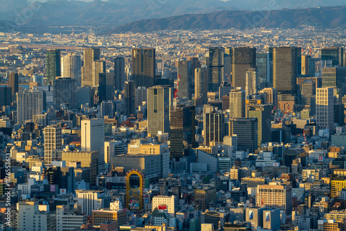 Cityscape of Osaka central area with skyscrapers in the evening photo