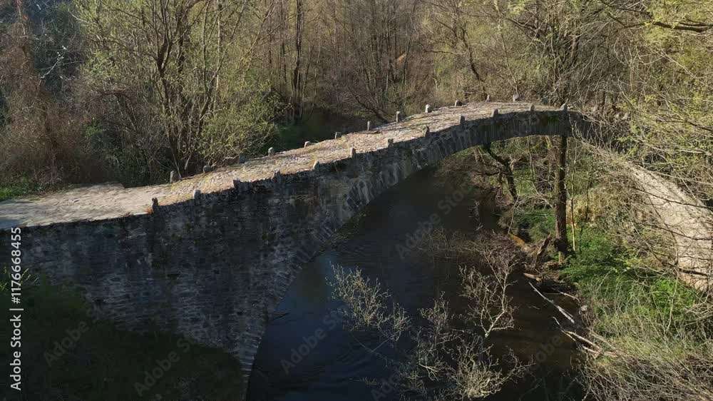 Revealing the Landscape and the Perfect Oval Shape of Bekiri Bridge in Kastoria Through Aerial Footage Revealing the Landscape and the Perfect Oval Shape of Bekiri Bridge in Kastoria Through Aerial Footage