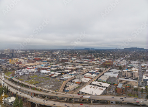 Obraz na płótnie A city view from above with a cloudy sky w salonie