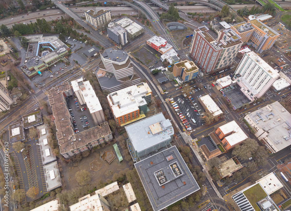 A city view from above with many buildings and cars