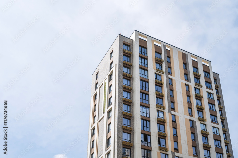 Multi-storey apartment building. New residential complex in the city Multi-storey apartment building. New residential complex in the city