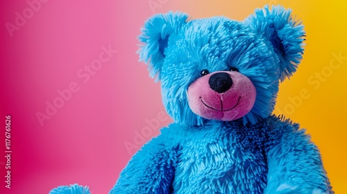 Blue toy bear isolated brightly colored studio backdrop