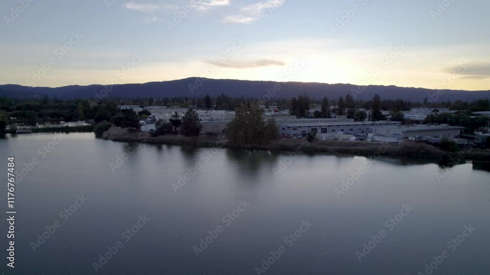 Drone flying by a lake at a park in california Drone flying by a lake at a park in california