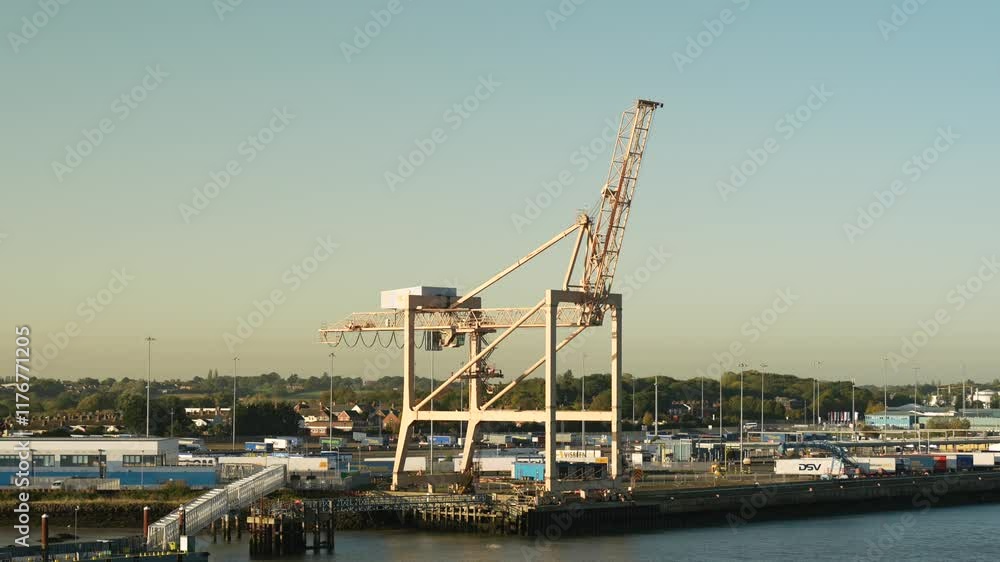 Harwich Ferry Terminal. Container crane in English shipping port Harwich Ferry Terminal. Container crane in English shipping port