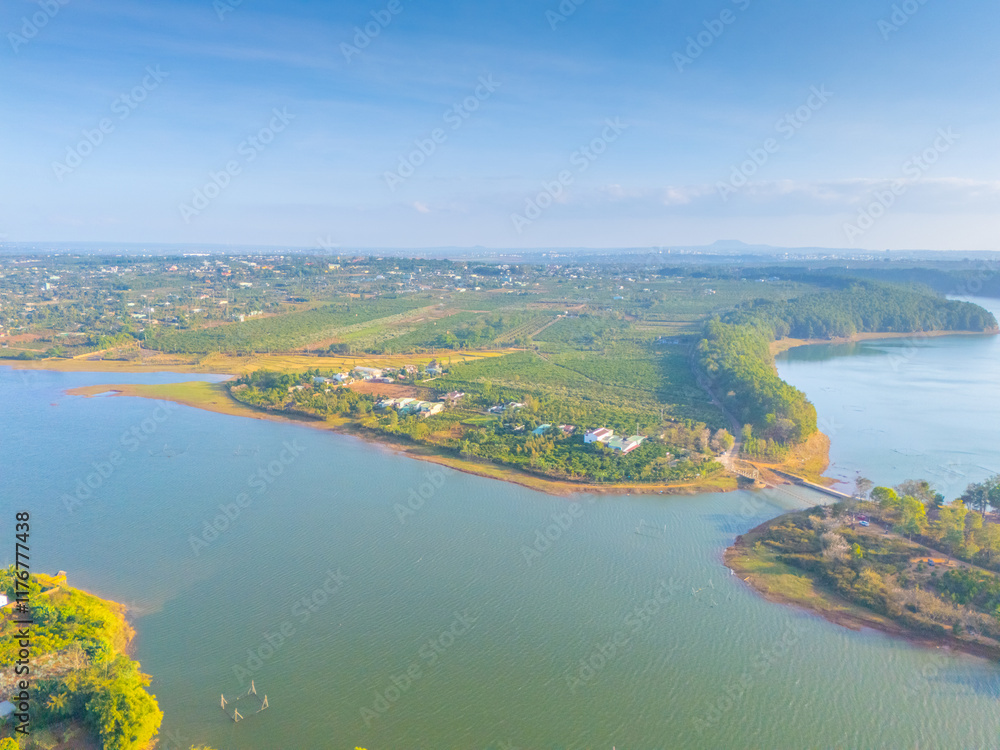 Fototapeta premium Aerial view of Bien Ho Che or Bien Ho tea fields, outside Pleiku city, Gia Lai province, Vietnam. Nature landscape, mountain and foggy far away.