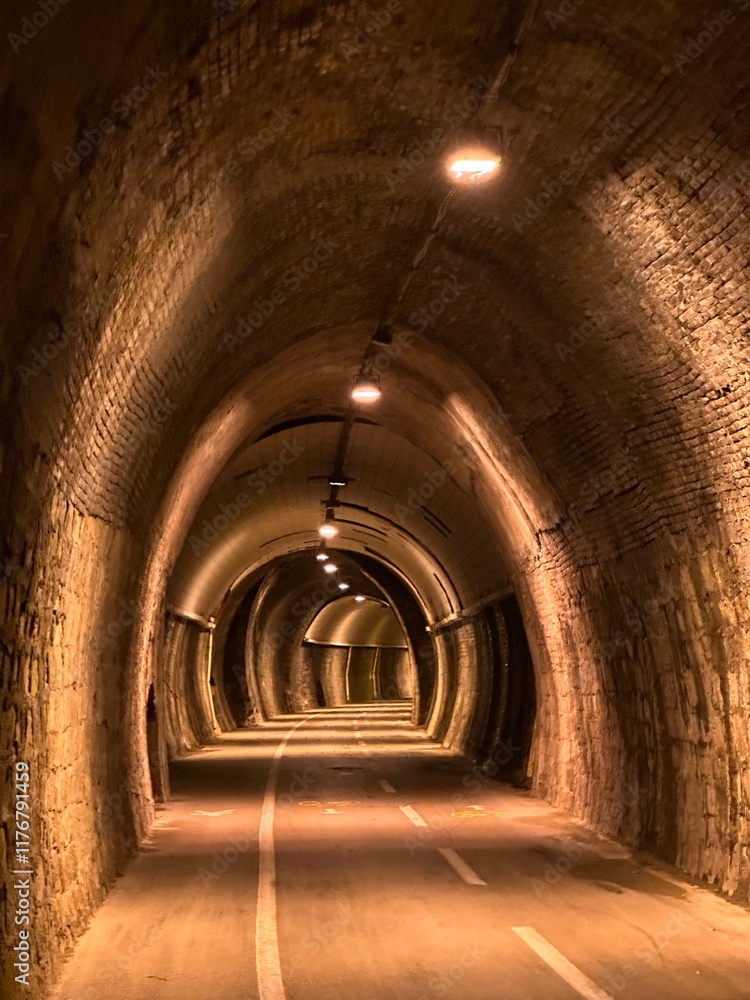 Old railroad tunnel converted to the Ponente Ligure cycling path near Sanremo, Liguria, Italy, October 2023 Old railroad tunnel converted to the Ponente Ligure cycling path near Sanremo, Liguria, Italy, October 2023