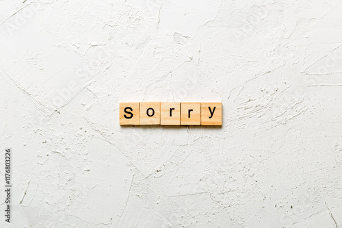 sorry word written on wood block. sorry text on table, concept photo