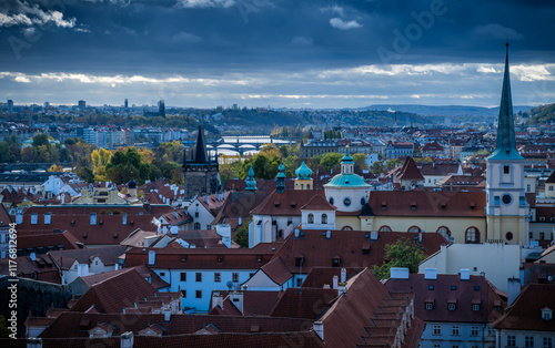 View of Prague's skyline featuring historic buildings on a cloudy afternoon photo