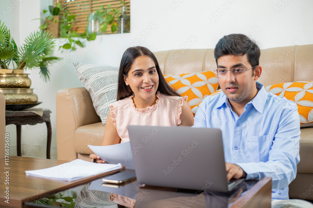 Couple Working Together From Home In Living Room Couple Working Together From Home In Living Room