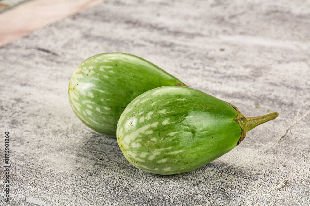 Ripe green mini eggplants heap Ripe green mini eggplants heap
