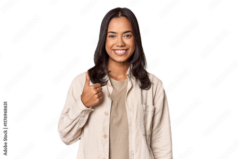 Portrait of a young Filipino woman smiling and raising thumb up