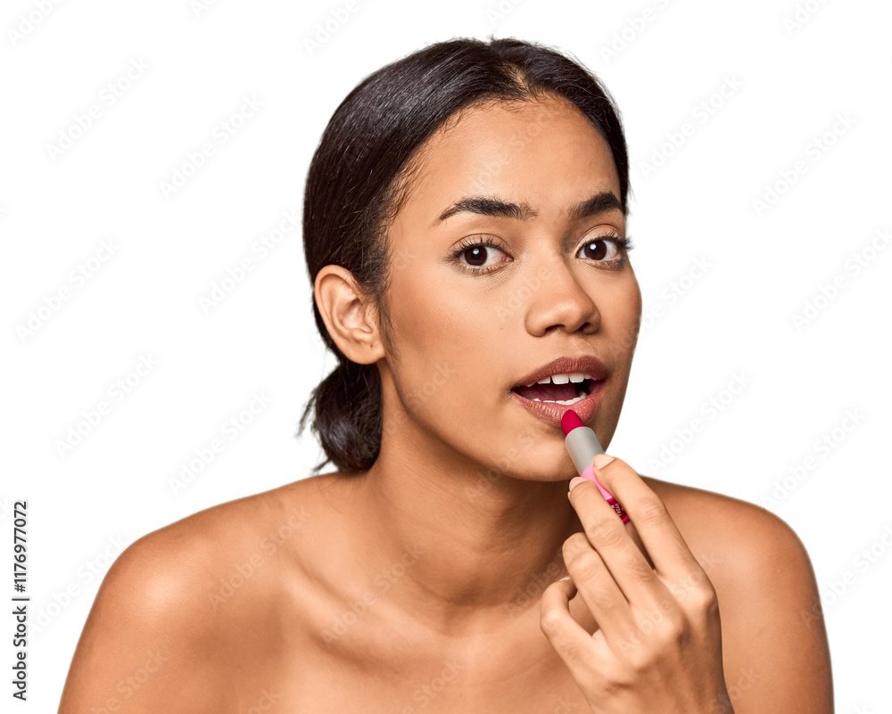 Filipino woman applying lipstick, beauty touch Filipino woman applying lipstick, beauty touch