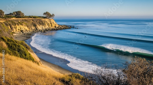 Cambria Surf Vibes: Waves Crashing on a Serene Beach Under a Blue Sky photo