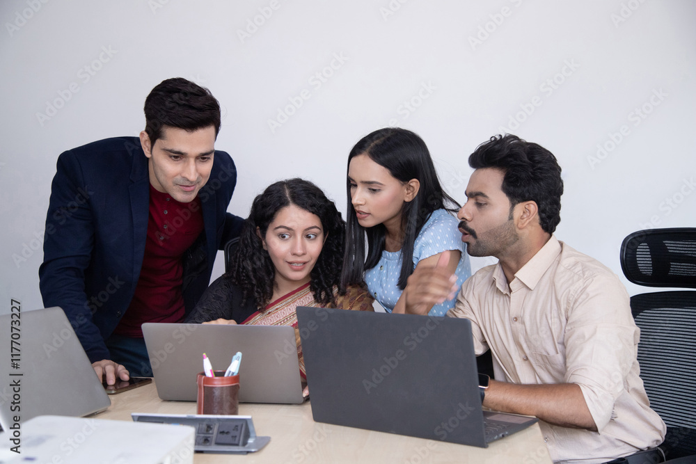 Corporate Employees Team Looking At Laptop Corporate Employees Team Looking At Laptop