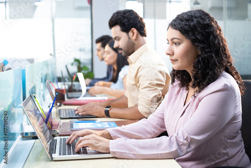Hardworking Employees Working On Laptop