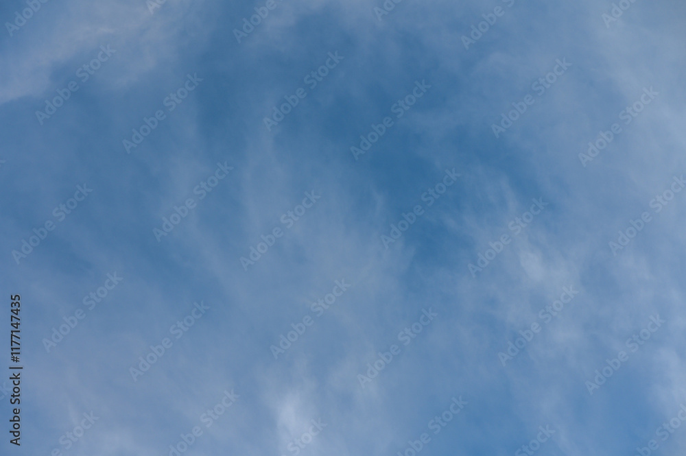 Majestic sky reveals swirling clouds and endless blue on a serene afternoon in early spring Majestic sky reveals swirling clouds and endless blue on a serene afternoon in early spring