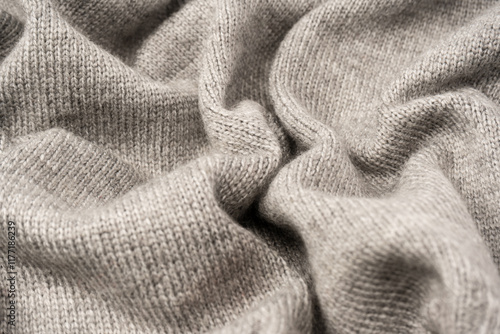 Grey wool sweater texture as a background. photo