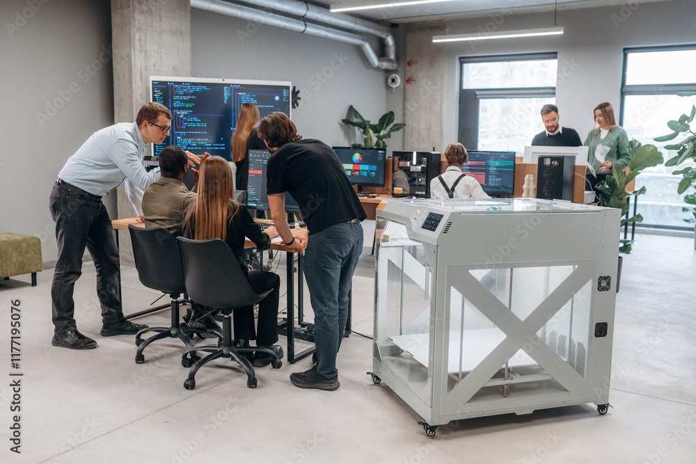 Obraz premium Big screen with code on the wall. People are in the office by the 3d printer
