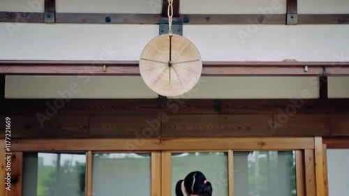 A happy young Japanese woman is excited to start a new school year
