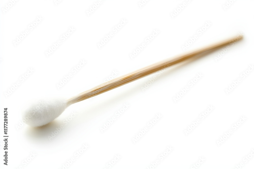 a single cotton swab on a white surface a single cotton swab on a white surface