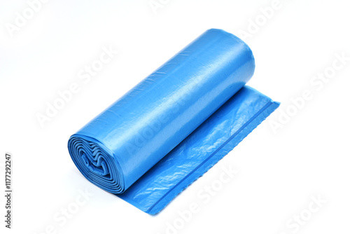 Roll of blue garbage trash bag on white background photo