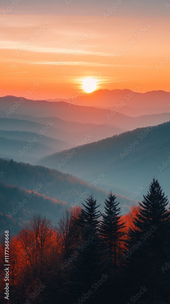 Obraz premium Autumn sunrise over layered mountains