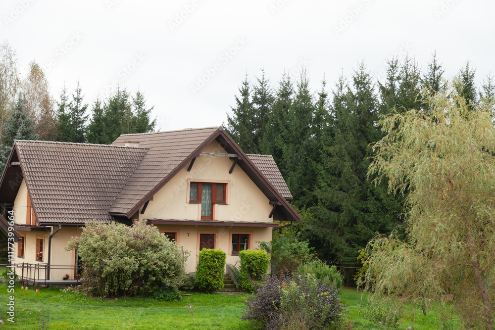 Charming house nestled in a lush green landscape, surrounded by trees. Perfect for a peaceful getaway. Charming house nestled in a lush green landscape, surrounded by trees. Perfect for a peaceful getaway.