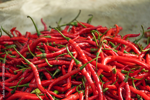 Pile of various chilies sold in Indonesian traditional wet market.  photo