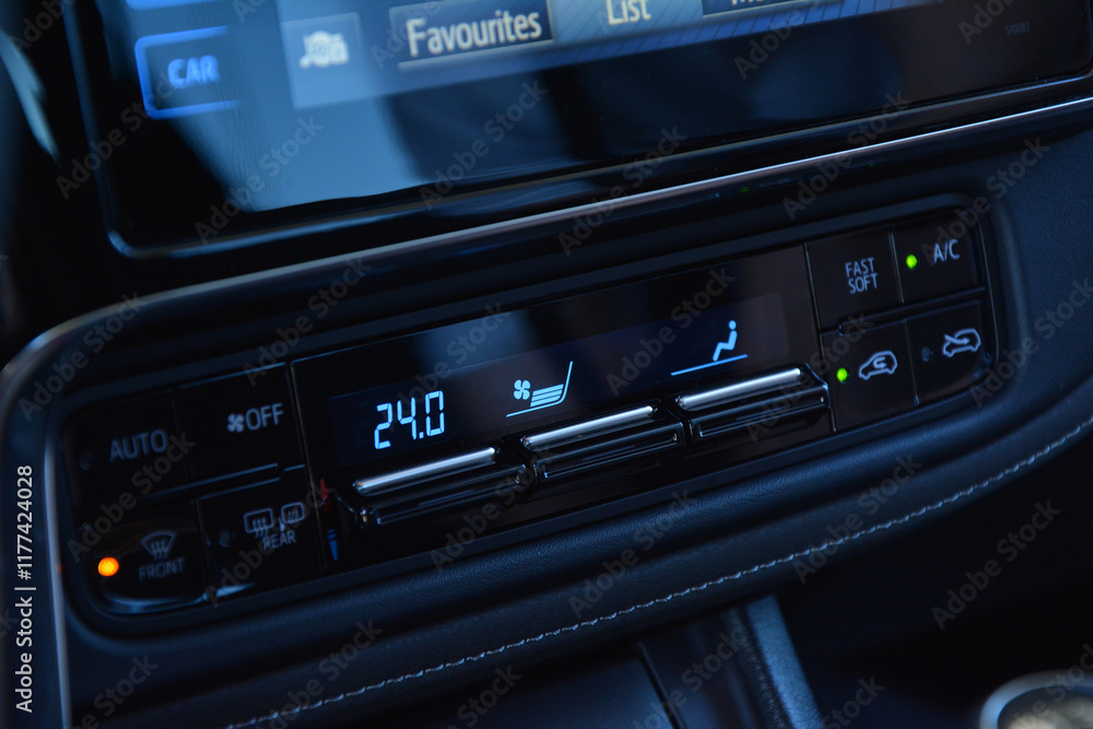 Modern car climate control panel showing temperature and settings Modern car climate control panel showing temperature and settings