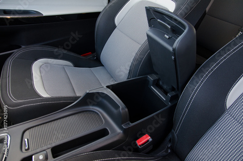 Bilde på lerret Modern car interior detail: center console with armrest and storage