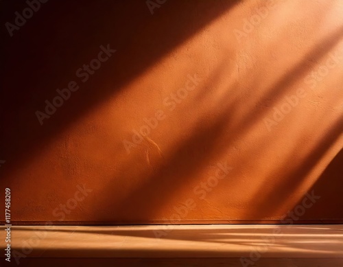 Sunbeams on Rustic Wall: A warm, inviting ray of sunlight streaks across a textured terracotta wall, casting a dramatic shadow and illuminating a wooden baseboard.