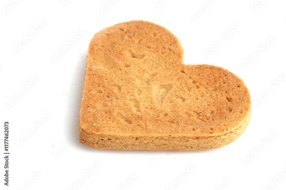gingerbread in the shape of a heart on a white background gingerbread in the shape of a heart on a white background