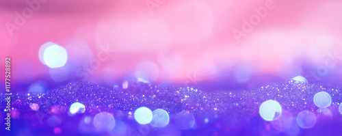Glittering purple and pink bokeh lights background creating festive atmosphere