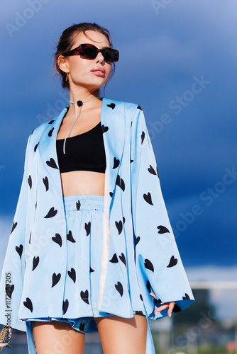 Stylish woman in a blue suit