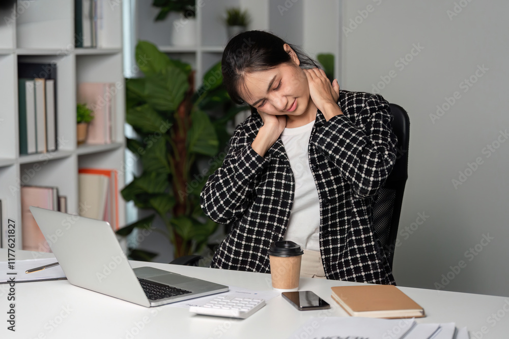 Exhausted Businesswoman at Desk with Laptop and Coffee in Modern Office Setting Exhausted Businesswoman at Desk with Laptop and Coffee in Modern Office Setting