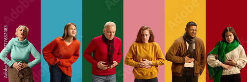 Foto Diverse group of people of different age holding their stomachs in pain, depicting symptoms of indigestion, food poisoning, abdominal illness