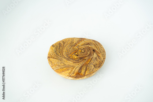 A Block of Jaggery Gud sakhar or Heated Chaku Made of ghee for Makar Sankranti Health Food Concept photo