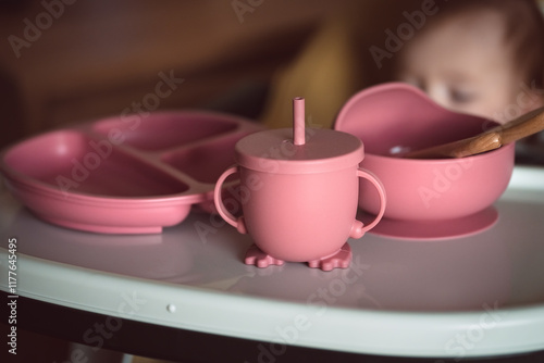Set of baby dishes made of bpa free silicone. Safe and non-poisonous tableware for kids. Ecologic and recycle concept.