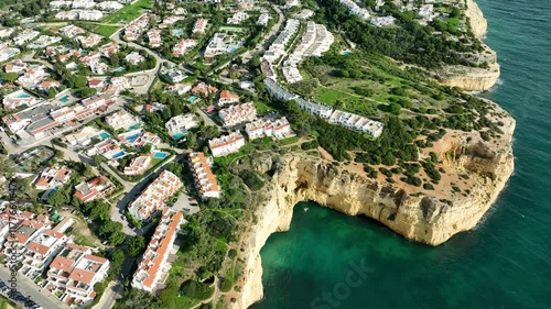 aerial view of Benagil Algarve beaches, portugal during sunset
