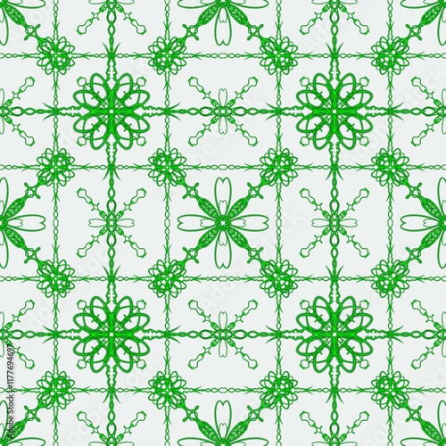 Seamless pattern featuring intricate green floral-inspired motifs arranged in a symmetrical grid on a light background, creating a decorative design.