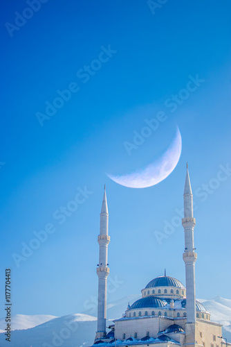 Ramadan or Islamic background photo: Alkazan Mosque with crescent moon