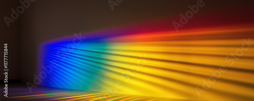 Colorful light beams creating a rainbow pattern on a wall