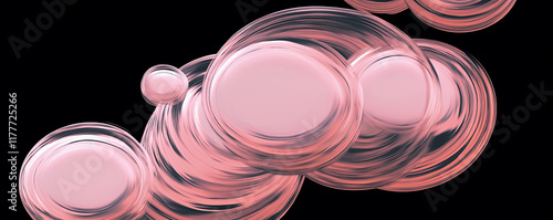 Pink bubbles floating on a black background creating an abstract pattern
