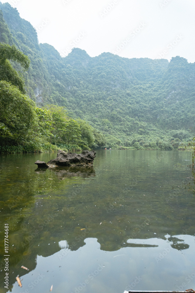 Fototapeta premium Ninh Binh, Vietnam. Reflections on a River